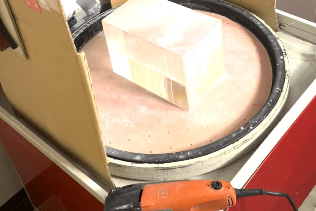 How to remove scratches from an optical glass sculpture